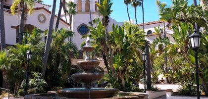 Spanish-style Courtyard fountain with palm trees