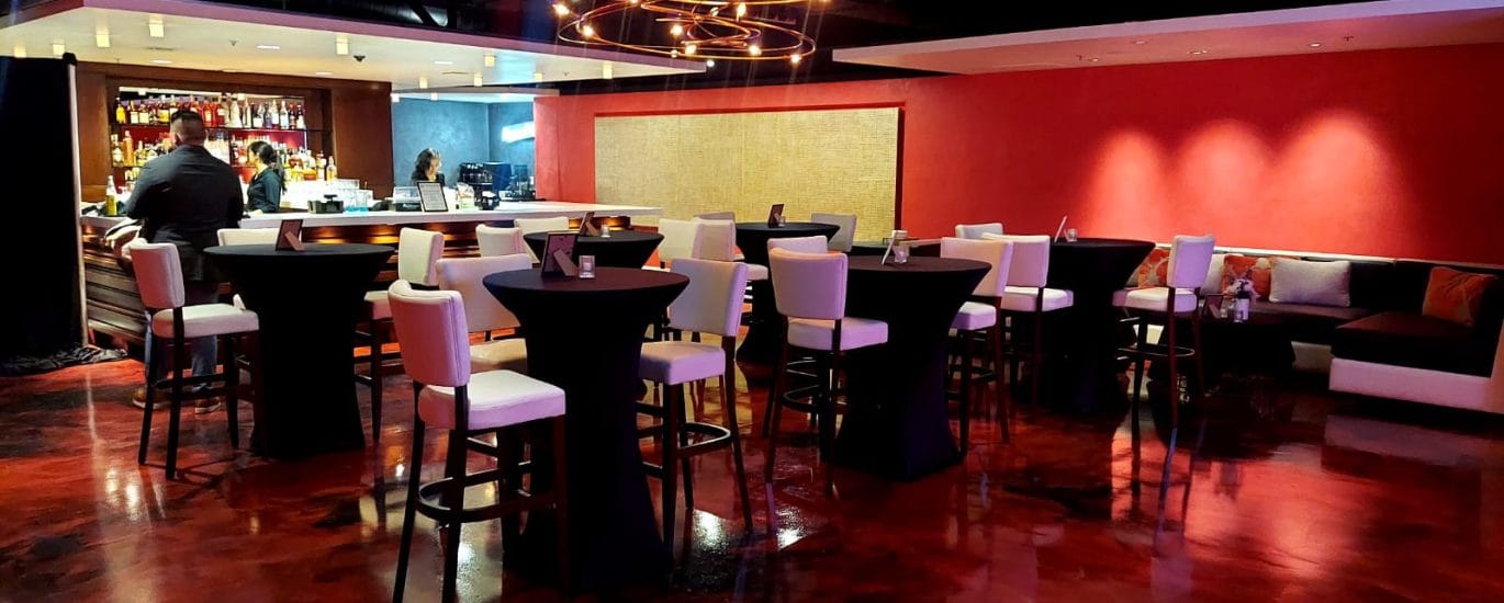 Modern bar interior with stylish seating and ambient lighting