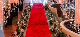 Romantic party entrance with red balloon decorations